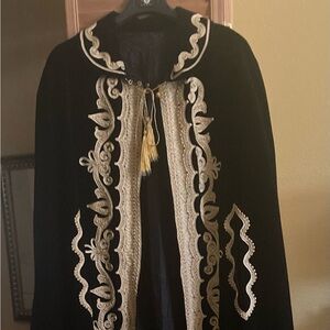 Black velvet gold embellished cape with arm slits,3 buttons gold tie